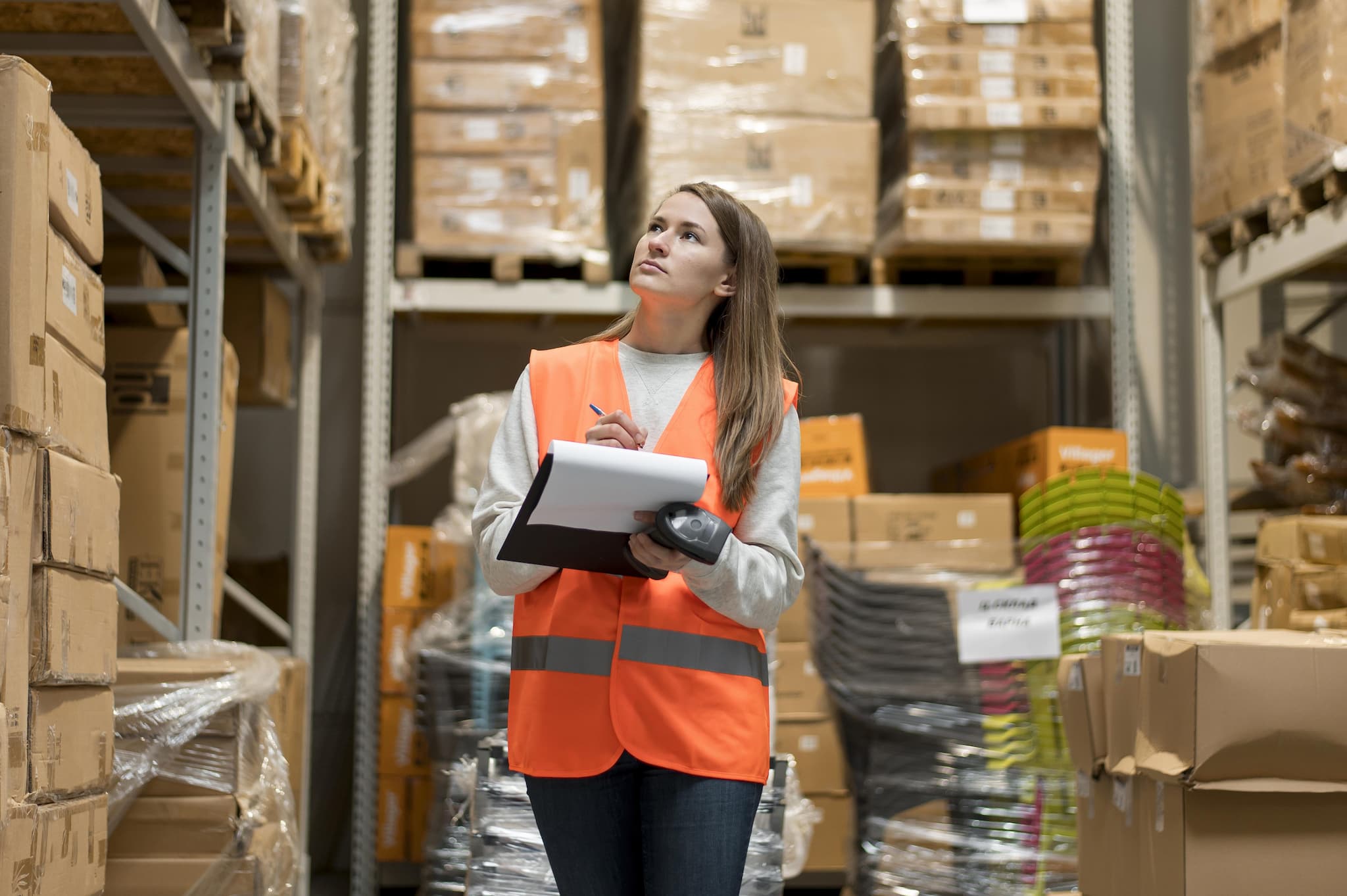 Woman in storage for logistics